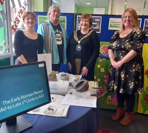 Pictured at the book launch are from L-R Esther Hamilton, Post Excavation Technician AOC; Les Capon, Fieldwork Project Manager, AOC; Cllr Joanna Hewitt, Sandy Town Mayor; Becky Haslam,  Project Manager AOC
