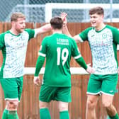 Jon Clements (left) and Harry Draper (right), who both scored twice, celebrate one of Clements' goals against Aylesbury. Photo by Mike Snell.