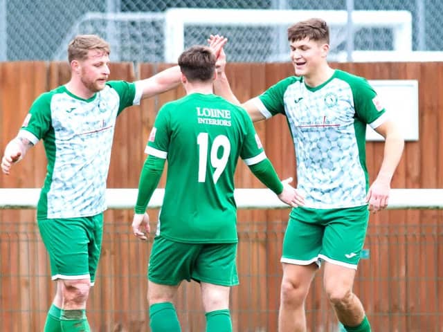 Jon Clements (left) and Harry Draper (right), who both scored twice, celebrate one of Clements' goals against Aylesbury. Photo by Mike Snell.