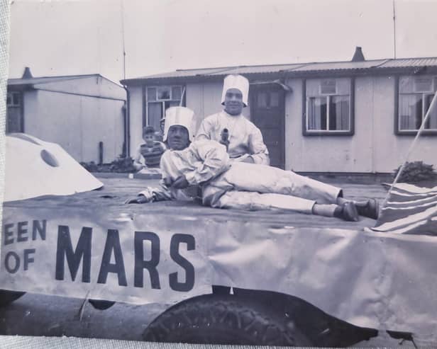 Roy (front) and Barry on the carnival float. Image supplied by Barry Smith.