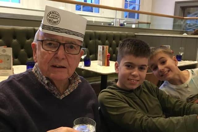 Some of Callum's favourite memories are trips to cafes and restaurants with his grandad - as well as trips to watch their football team, Luton Town. Image supplied by Callum Wilson.