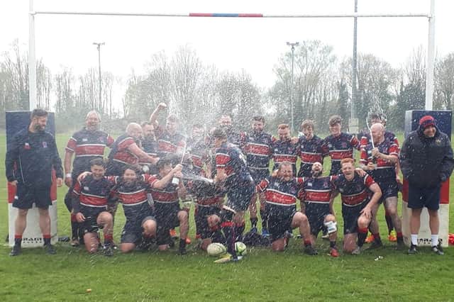 Biggleswade's first team celebrate in style after they won the Midlands Four East (South) title thanks to an emphatic 69-3 victory over South Leicester