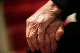 The hands of an elderly woman