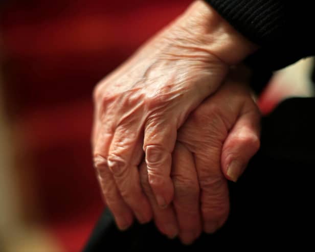 The hands of an elderly woman