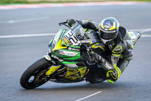 Lewis Smart exits the final corner Goddards at Donington Park. Photo: Colin Port.