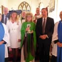 Back Row (L-R): Mick Bister (Restoration Secretary), Revd Trevor Wilcox (Preacher) and Francis Coales (Charitable Trust Trustee), Venerable Dave Middlebrook,
(Archdeacon of Bedford). Front Row (L-R): Christine Elcombe (Lay Reader), Mrs Susan Lousada, (Lord-Lieutenant of Bedfordshire), Revd Liz Lavelle (Parish Priest in Charge) holding the Coales Memorial Chalice, Martin Stuchfield (Chairman of the Trustees), Tony Elcombe (Lay Reader).