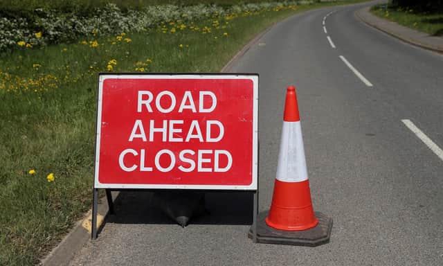 File photo of a road closed sign