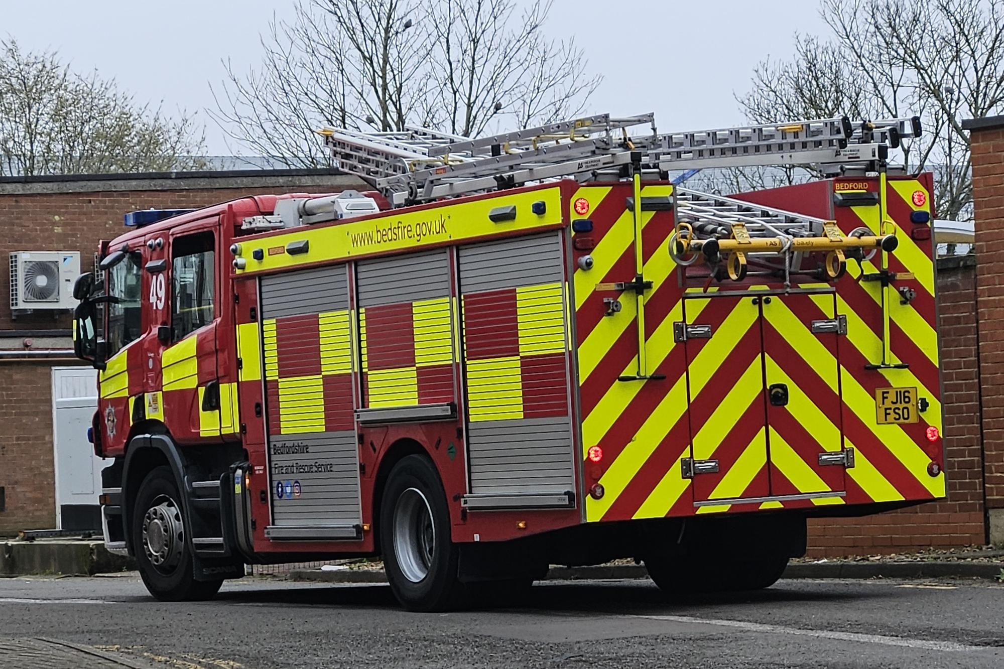 Fire crews tackle large woodland blaze near Sandy