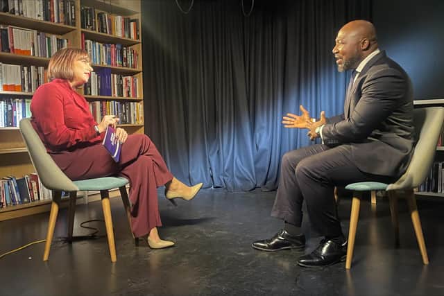 Pictured: Beth Rigby sits down with Festus Akinbusoye