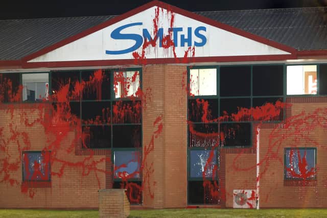 Red paint was thrown over the outside of the company