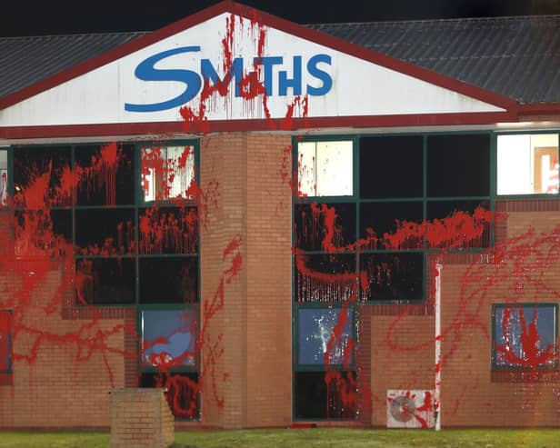 Red paint was thrown over the outside of the company