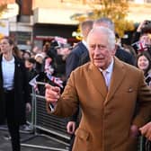 King Charles' first New Year's Honours List has been announced. Our picture shows the King on a recent visit to Luton