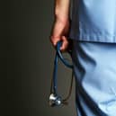 Male doctor with stethoscope