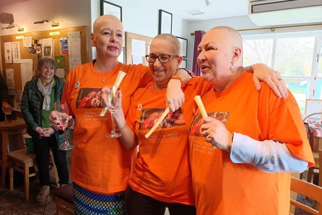 Pam (left) with Jo and Sue after their charity head shave.