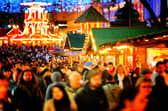 There's nothing warming yourself with a hot drink walking around Christmassy stalls on a wintery evening! Picture: Christopher Furlong/Getty Images