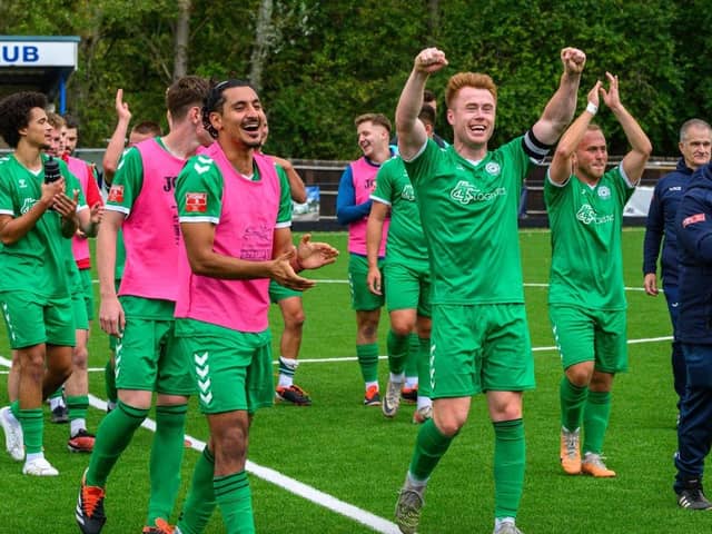 Biggleswade FC celebrate their FA Cup win, with scorer Lawrie Marsh (centre) leading the cheers. Photo: Guy Wills Sports Photography.