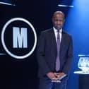 Clive Myrie with Mastermind Trophy