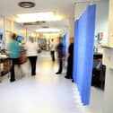 Staff on a NHS hospital ward. Photo from Peter Byrne/PA Images