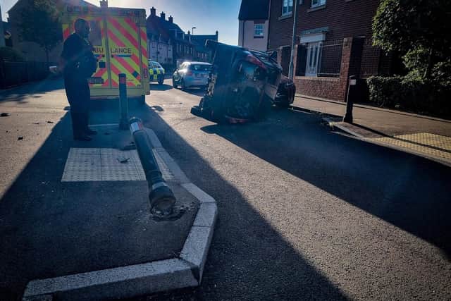 Driver has lucky escape as vehicle flips on side after crash in Stotfold