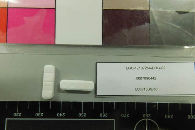 Image of counterfeit xanax from blue barrel.