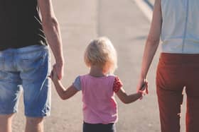 Famlily holding hands. Image by Pexels from Pixabay