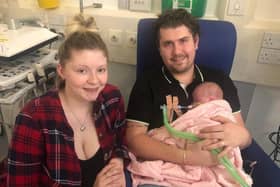 Hallie with dad Josh and mum Rebecca