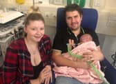 Hallie with dad Josh and mum Rebecca