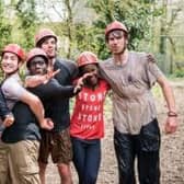 Explorers having fun in the mud