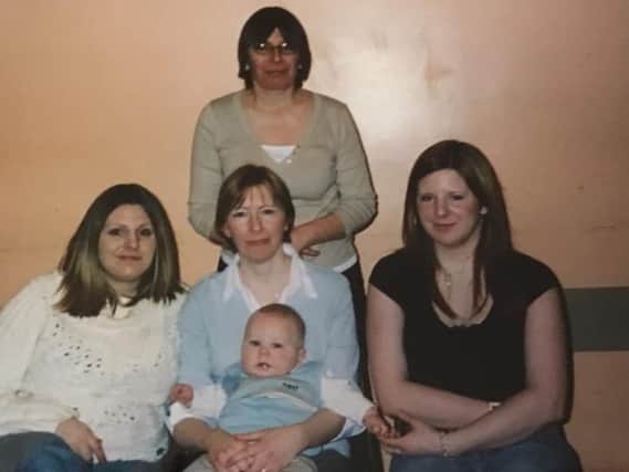 Claire with her daughters, Laura, Anne and Sophie, and Grandson Miles two years before she died.