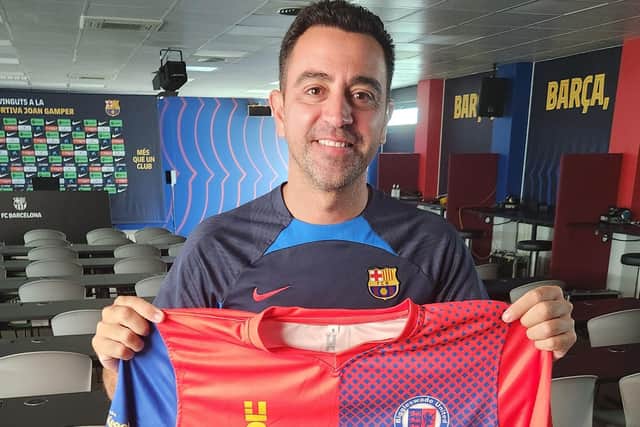 Proving once again that the support network for Biggleswade United extends far and wide, here is picture of World Cup and multiple La Liga and Champions League winner, the Barcelona and Spain legend and current Barcelona manager, Xavi Hernandez, showing his support for Biggleswade United when he met up with club chairman Guillem Balagué recently.