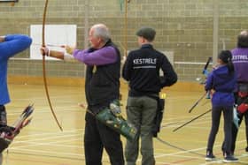 Pictured in action (l-r) are Lesley Brown, Mike Collins and Sidney Howard-Jude.