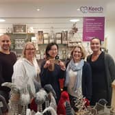 Staff at Keech Hospice Care shop celebrate the launch of the first nationally accepted multi retailer gift card to be spent exclusively in charity shops