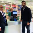 Krishan Modi pictured with his father, Has, the founder and chairman of Jardines, who started the business 43 years ago, and a member of staff