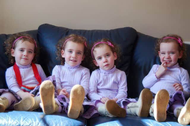 Lto R: Ellie, Georgie, Holly and Jess on their third birthday. Picture: Jose Carles / SWNS
