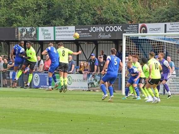 Action from Biggleswade FC's (in green) clash with Bedford Town. Photo: Adrian Brown.