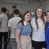 Smiles from Beth, Sadie and Catriona as they collect their exam results. Beth (left) was among the school’s top performers, and is off to the University of Oxford after
achieving four A* grades. Image: BEST