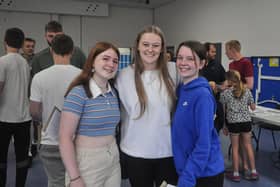 Smiles from Beth, Sadie and Catriona as they collect their exam results. Beth (left) was among the school’s top performers, and is off to the University of Oxford after
achieving four A* grades. Image: BEST