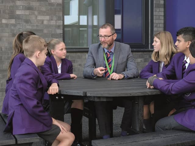 Pix Brook Academy Principal Steve Adams pictured with pupils