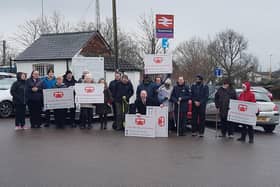 Campaigners at the railway station