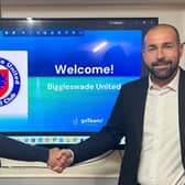 Fran Constancio (left) and Biggleswade United head coach Cristian Colás confirming their agreement to use the app in the future