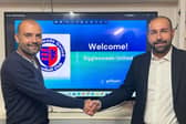 Fran Constancio (left) and Biggleswade United head coach Cristian Colás confirming their agreement to use the app in the future