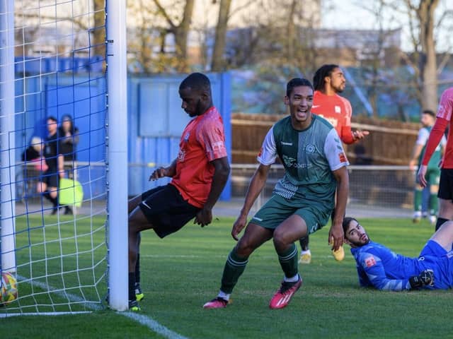 Amaru Kaunda celebrates his first goal in Biggleswade FC's win on Saturday. Photo: Guy Wills.