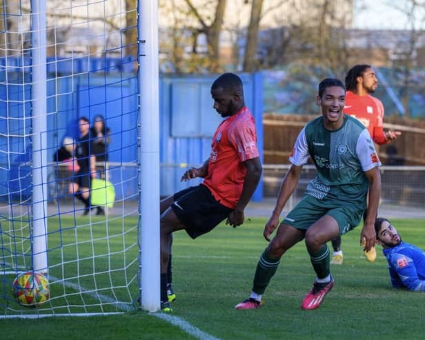 Amaru Kaunda celebrates his first goal in Biggleswade FC's win on Saturday. Photo: Guy Wills.