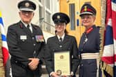 Tulah Nixon (centre) accepts her new role. Image: Bedfordshire Fire and Rescue Service.