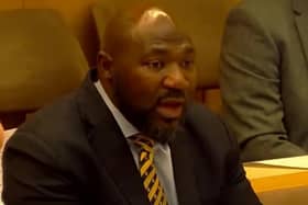 Bedfordshire police and crime commissioner Festus Akinbusoye speaks at the meeting