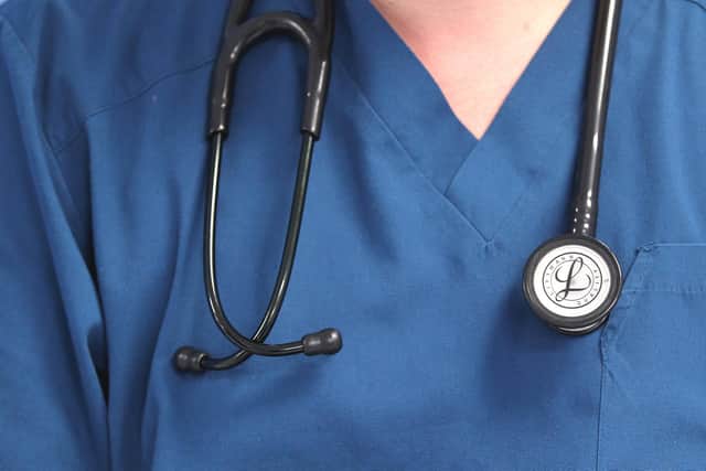 A doctor holding a stethoscope. Picture: Lynne Cameron/PA