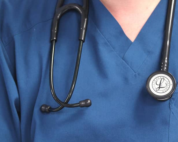 A doctor holding a stethoscope. Picture: Lynne Cameron/PA