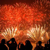 Fireworks illuminate the Hong Kong. Photo by Lam Yik Fei/Getty Images