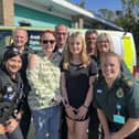 Lexi Ashwell (fourth from right) with her mum Michelle and some of the team from Bedfordshire Police and EEAST who helped save her life