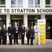 Principal Sam Farmer with students from Stratton School celebrating a highly positive Ofsted report.